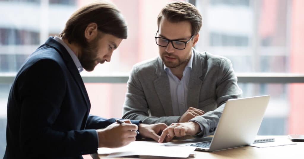Lawyers reviewing contract