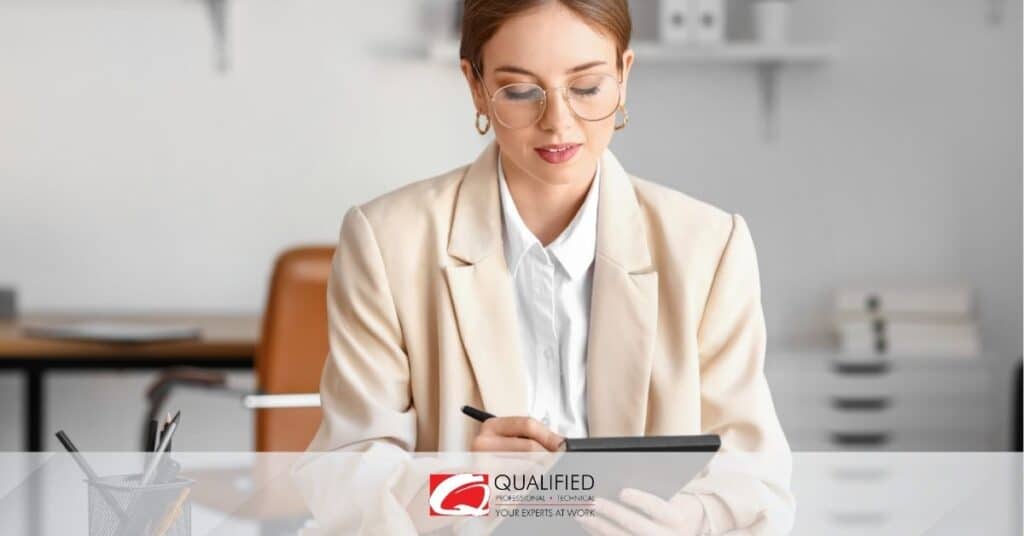 a woman checking a tablet with questions